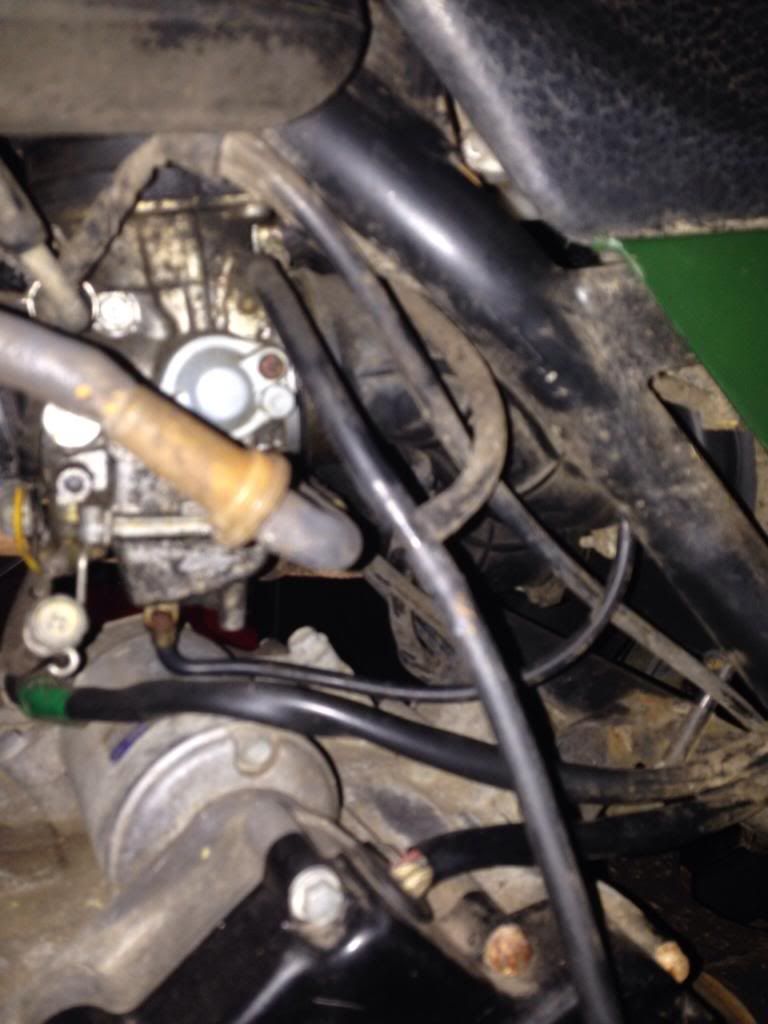 Please some help. Tube dangling by fuel line Yamaha Grizzly ATV Forum